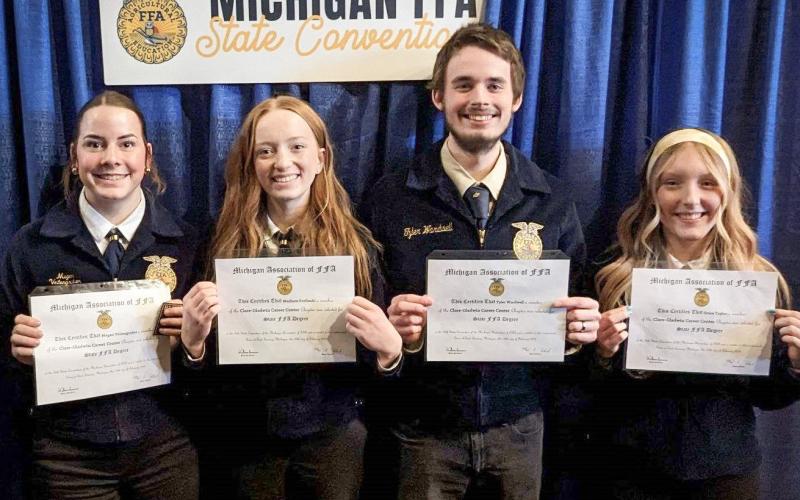 Pictured left to right: Megan Veitengruber (Clare High School), Madison Forfinski, and Tyler Wardwell (Farwell High School), alongside Grace Taylor (Harrison High School), proud recipients of the State FFA Degree Certificate. Veitengruber and Forfinski were also presented with Gold Awards for Academic Excellence.