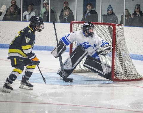 Gladwin goalie Preston Willert guards his cage during Saturday’s mercy ruleshortened 9-1 victory over the MId-Michigan Raptors.