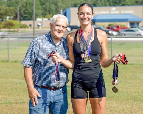 Ava Gary, pictured with her Gladwin High School Track Coach, Kernie Gilliam.