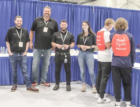 High School sophomores from Gladwin County will have the chance to interact with more than 70 employers at the 2024 MiCareerQuest Middle Michigan event. Pictured here at last year’s event are representatives from Saint-Gobain in Beaverton.