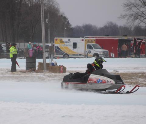 Harvey Zelt roars into a turn during the recent Vintage Snowmobile Race at the Gladwin County Fairgrounds.