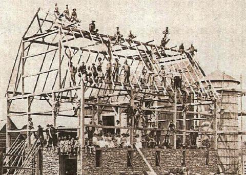 The Powley barn raising on the east side of Hockaday Road in Section 10, later the Sheehan Farm. PHOTO PROVIDED BY JULIE ELLIS