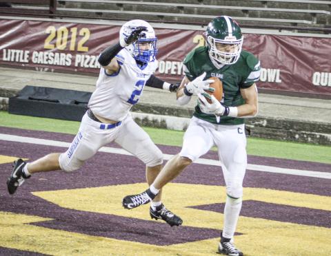 lare’s Jacob Halicek catches a touchdown pass during Friday night’s victory over Ortonville Brandon at Central Michigan University’s Kelly/Shorts Stadium.