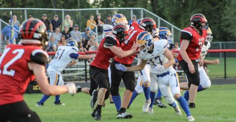 Beaverton Varsity are pictured going head-to-head with Evart.