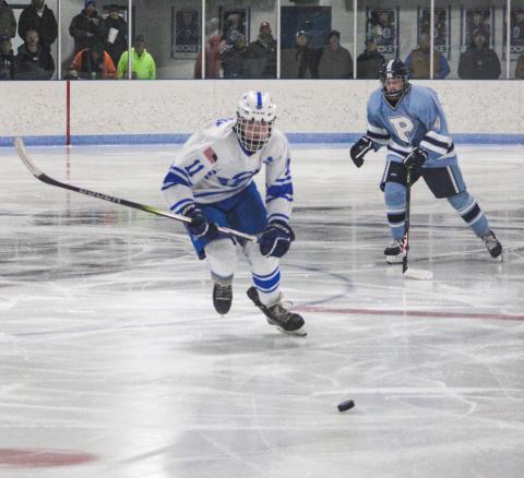 Clay Newman scored the inner in overtime Friday night when the Gladwin hockey team topped the visiting Lakeshore Badgers 6-5.