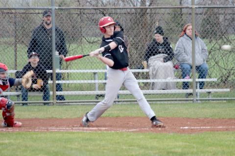 Reese Longstreth swings, looking to knock the ball for a base hit.