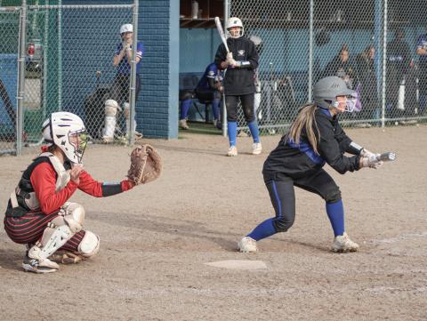 The bunt sign is on for Gladwin batter Addison Tyslicki during last week’s doubleheader sweep at the hands of visiting St. Louis.