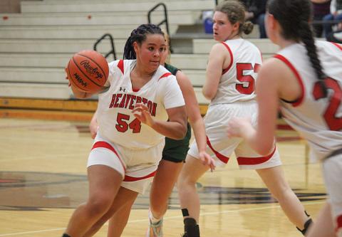 Leiyah Mungin drives towards the net against Clare.