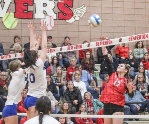 Beaverton’s Kaelyn Fischer goes for the kill during the Beavers five-set loss to Beal City in the Division 3 district finals Thursday.