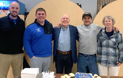 Pictured left to right are: current football coach, Marc Jarstfer; defensive coach; Kody Emeott, Mike Bailey, Kenny Owens, and Ruth Ann Joslin.