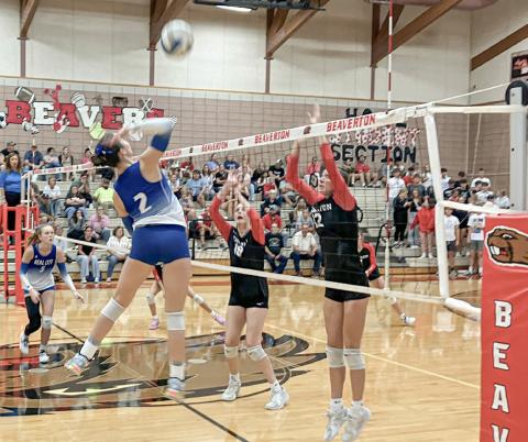Beaverton’s Taryn Roberts (left) and Trinity Danielak defend the net during last week’s season-opener against visiting Beal City.