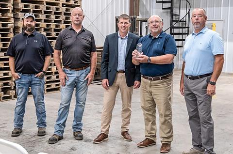 MDARD Director Tim Boring presents the 2026 Ag Exporter of the Year Award to Freeland Bean &amp; Grain Marketing Manager Roger Hupfer at a ceremony in Freeland, MI on Aug. 12, 2026.
