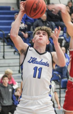 Gladwin’s Trace Corlew grabs a rebound during a recent game.