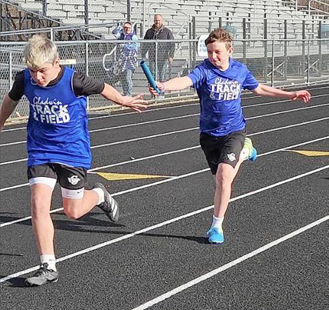 Lucas Evans and Owen Klein completed a great handoff in the 4x200 meter relay.