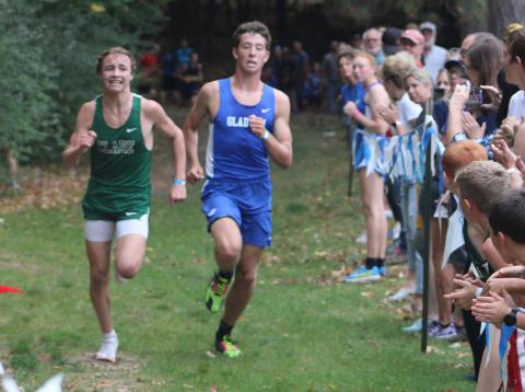Clare’s Brad White edges Gladwin’s Caleb Palmreuter for the gold medal at the Jack PIne Conference jamboree last Wednesday at the Gladwin County Recreation Area. The Flying G’s placed first as a team.
