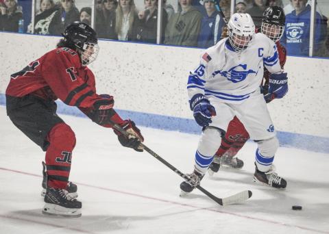 Gladwin’s Treyton Siegert puts his considerable soccer skills to use after losing his stick during a recent game.