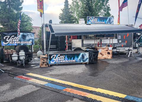 The Yetti Old World Cuisine Food Truck rolled into Novi recently and won two awards at a prestigious BBQ contest. Owners (inset, left to right) Greg, Tracy and Jon Curtis got some air time with Detroit TV newscaster Scott Wolchek.
