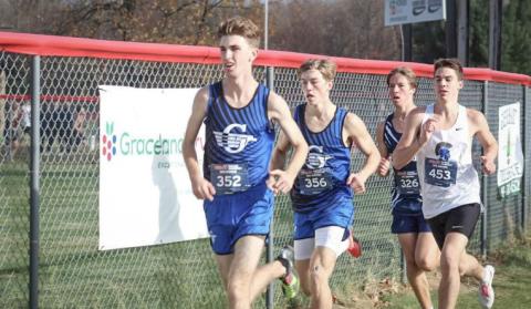 Gladwin’s Elijah Christensen won the regional championship and teammate Seth Mead was second Friday when the Flying G’s defended their title in the Divison 2 race at Benzie Central.