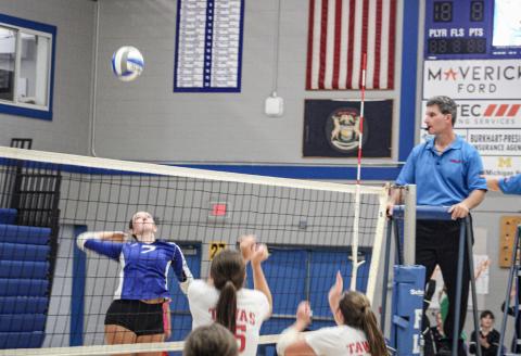 Gladwin’s Ansley Mausolf rises up for the kill during a match earlier this season. The Flying G’s will host Farwell this evening to open JPC action.