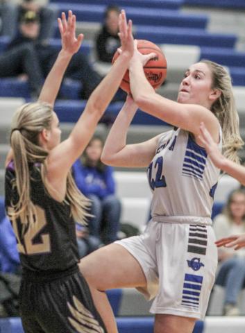 Lizzie Haines goes up with a shot during a game last season. The senior returns to the starting lineup for Gladwin this year.