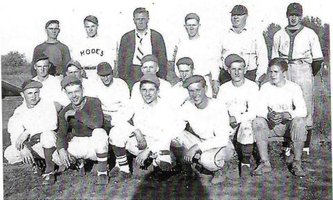 The 1940 Rhodes Baseball team, which included three members of the Carstens’ family: William (Bill), Sr., center backrow/manager, Cal Carstens, far right back row, and Robert Carstens, far right second row. Cal Carstens, who is being inducted posthumously at the 2025 NEM baseball reunion, had just joined the team as a pitcher, after playing minor league baseball for the Cincinnati Orinda Reds in California.