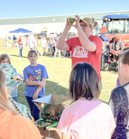Fifth grade students learn about small farm animals at Farm Bureau’s Project RED hosted by Clare-Gladwin CTE.