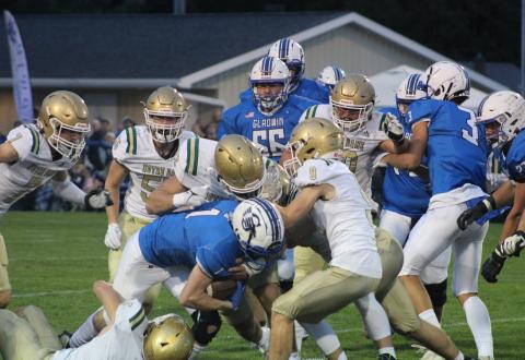 Gladwin’s Trace Corlew breaks a tackle during Friday night’s homecoming battle with undefeated Pontiac Notre Dame Prep.
