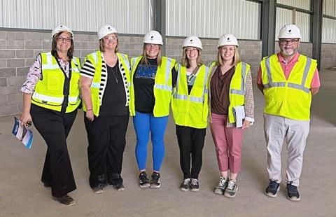 Pictured are: Dorothy Mott, Chris Rowley, Amy Bunting, Jordan Ensing, Alexa Carey and Cal Seelye II. Mt. Pleasant Area Convention &amp; Visitors Bureau President and CEO Chris Rowley, along with members of the MPACVB Board of Directors, toured the future site of the Morey Event Center on Mid Michigan College’s Mt. Pleasant campus.