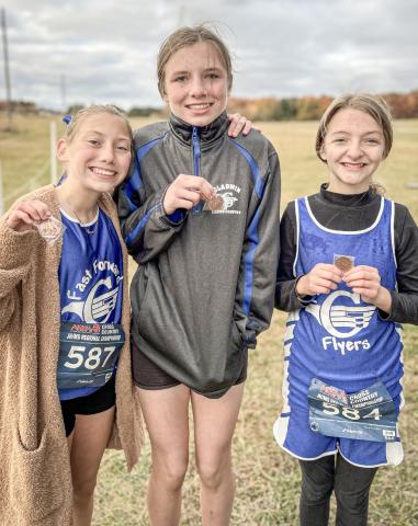 Pictured left to right: Vada Povey, Arliena Grant, and Isabelle Hurst.