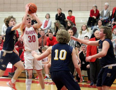 Layk Woodruff takes a shot against Saginaw Valley Lutheran.