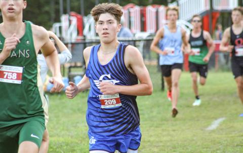 Gladwin’s Ben Verellen chases the leaders during a recent meet. The senior finished second Saturday at Northwood.