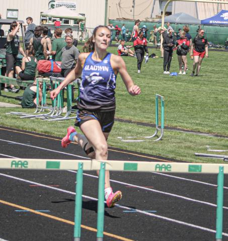 Gladwin’s record-setting hurdler Ava Gary is on the run during a recent meet. The senior is qualified to race in four events at the MHSAA Finals Saturday.