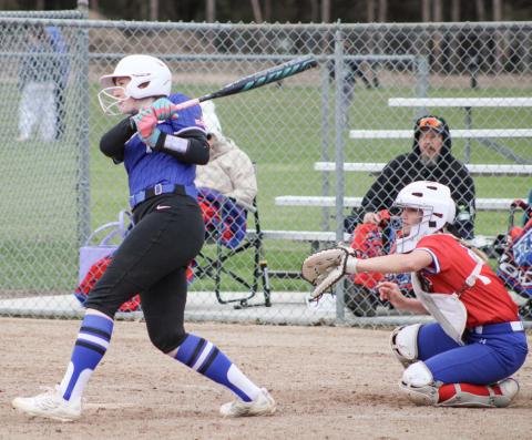Gladwin’s Elizabeth Mickler makes contact during Friday’s doubleheader with visiting Remus Chippewa Hills.