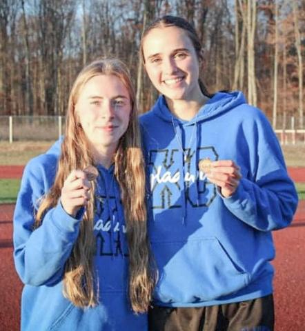 Gladwin’s Lily Binger (left) ran 11th and Abby Robinson was 13th at Friday’s regional, which earned both a trip to the state meet.