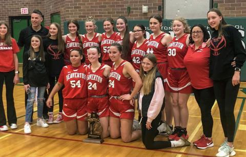 The Lady Beavers after defeating Houghton Lake at the District Finals on Friday night. PHOTO PROVIDED BY MARTIN MICHAEL HODGE