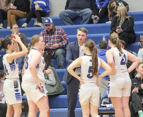 New Gladwin coach Nick Taratuta instructs the troops during a time out in the middle of Thursday’s wild double overtime loss to Shepherd.