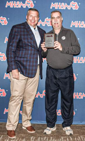Referee Volk saluted for 20 years in stripes