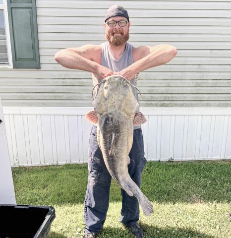 Codie Carlson, of Newport, Michigan, was bowfishing Plum Creek in the early-morning hours of Sunday, June 29, when he brought in a new state-record flathead catfish weighing 64.46 pounds in Monroe County.