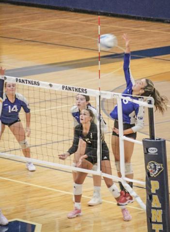 Gladwin’s Kamya Cajigas goes up for the kill during last Wednesday’s three-set victory at Standish-Sterling.