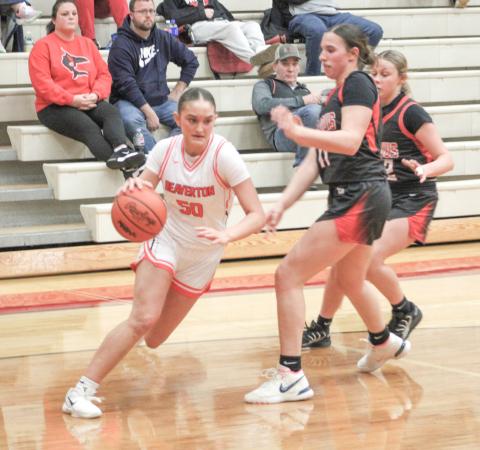 Beaverton’s Myah Hubble turns on the jets and blows by the defense on her way to the basket during last week’s victory over St. Louis.