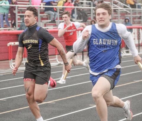 Gladwin’s Colton Pfenninger charges to the finish line at the end of the 400 relay at Wednesday’s meet at Beaverton.