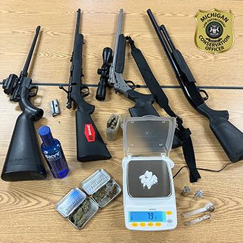 Conservation officers seize four firearms and drugs during traffic stop