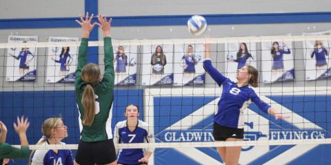 Gladwin’s Maddie Pagel goes up for a kill during last Wednesday’s three-set victory over visiting Clare.
