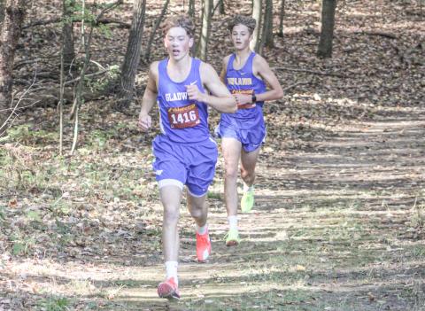 Seth Mead ran off with the gold medal in a school record time of 15:25.8 at the Northern Michigan Meet of Champions in Cadillac.