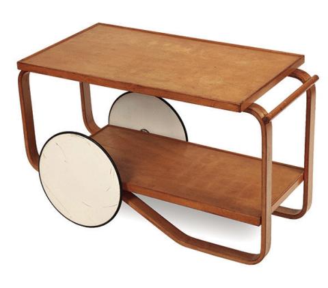 Scandinavian modern design gives an Artek tea trolley a sleek, stylish look. KOVELS.COM