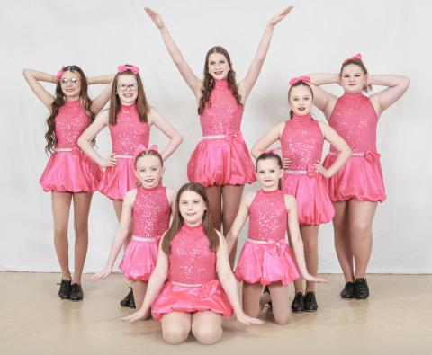 Jr. Tap earned the highest possible adjudication of a platinum, plus an overall and a special judges’ award highlighting how clean their dance was performed. Dancers pictured left to right are: Ava Adame, Jasmine Muma, Jaelyn Greenman, Paige Kruske, Ragen Burgess, Rylee Garvie, Maggie Lang, and Morgan Fitzpatrick.