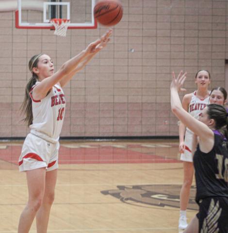 Beaverton’s Harper Pollard launches a 3-pointer that went in off the glass at the buzzer ending the first half of Friday night’s win over Farwell.