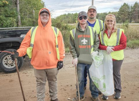 Highway clean up: Riley Banfield, Dylan Moore, Brian Sharpsteen (in back) and Chrissy Sharpsteen.