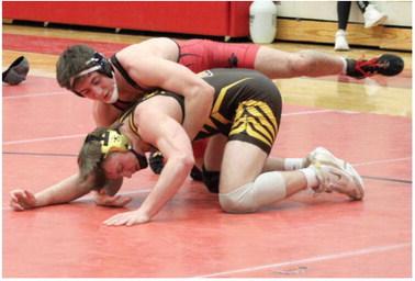 Beaverton’s defending state champion Eli Roe battled his way to the championship at 175 at the Jack Pine Conference Tournament Saturday.