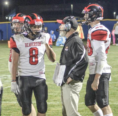 Beaverton coach Aaron Seiser talks things over with his players during a time out. The Beavers will host St. Louis Friday night.